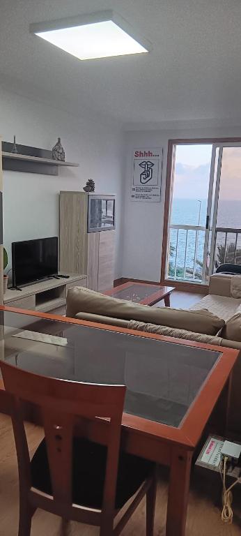 A television and/or entertainment centre at Apartamento mirador del Mar