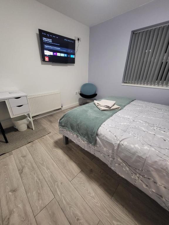 Postel nebo postele na pokoji v ubytování Prime Retreats - Flynn House
