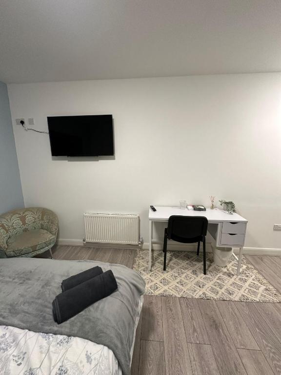 TV a/nebo společenská místnost v ubytování Prime Retreats - Flynn House