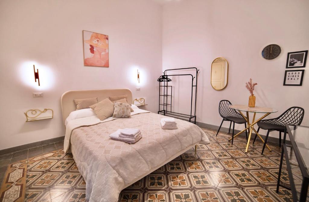 Postel nebo postele na pokoji v ubytování La Corte rooms