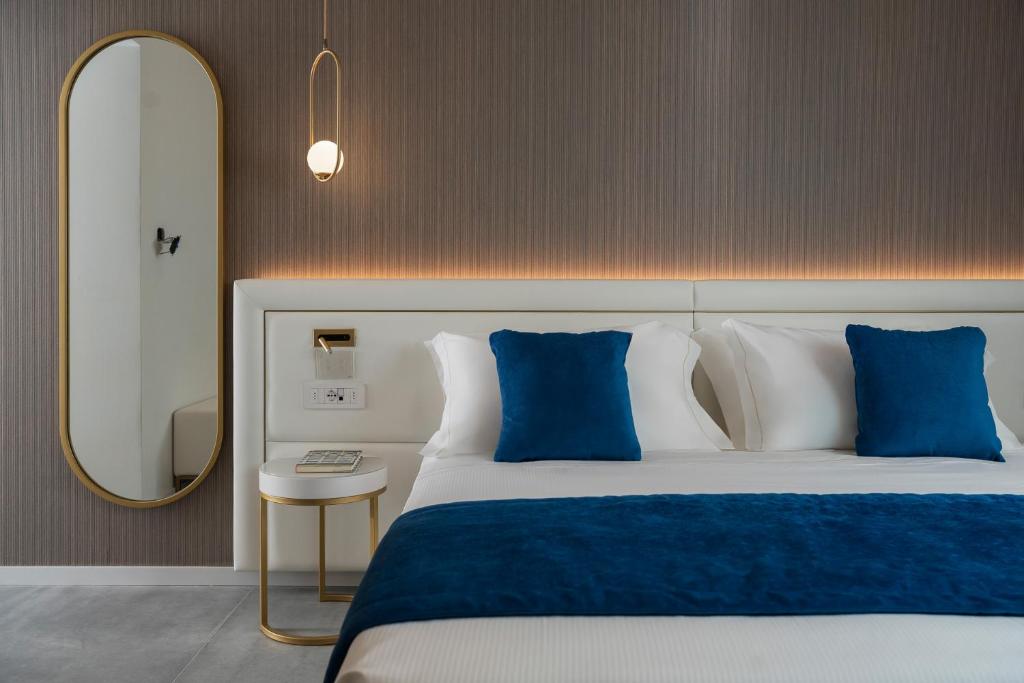 Postel nebo postele na pokoji v ubytování Hotel Parma e Oriente Wellness & Spa