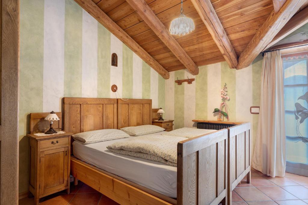 Postel nebo postele na pokoji v ubytování Agriturismo Alpenvidehof