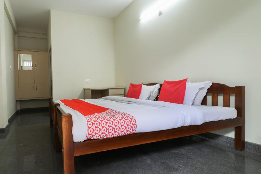 Postel nebo postele na pokoji v ubytování Hotel O Appas Residency