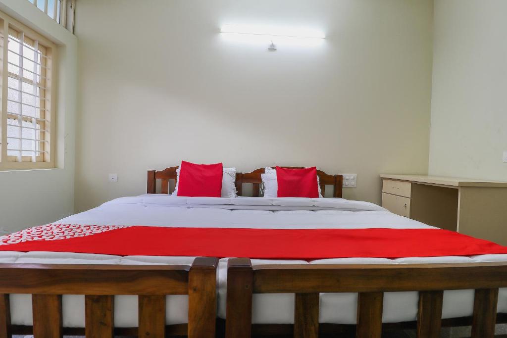 Postel nebo postele na pokoji v ubytování Hotel O Appas Residency