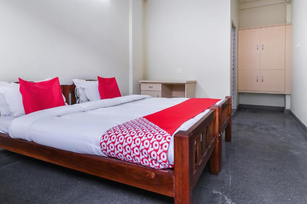 Postel nebo postele na pokoji v ubytování Hotel O Appas Residency