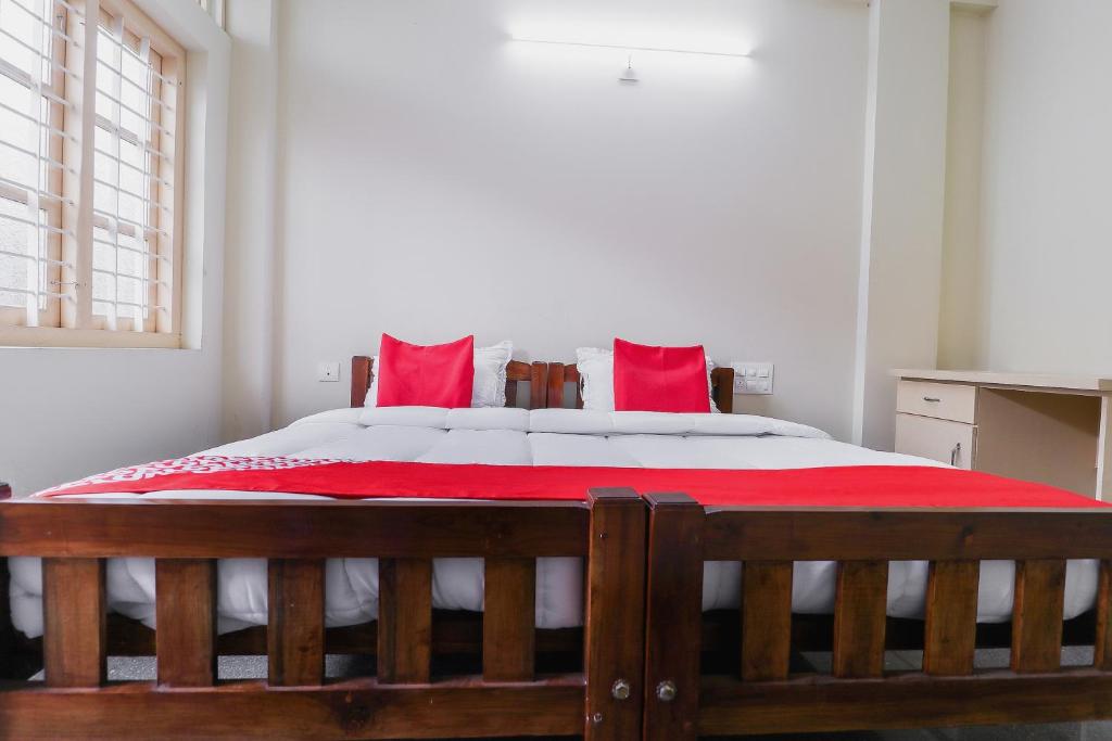 Postel nebo postele na pokoji v ubytování Hotel O Appas Residency