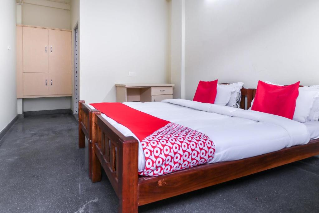Postel nebo postele na pokoji v ubytování Hotel O Appas Residency