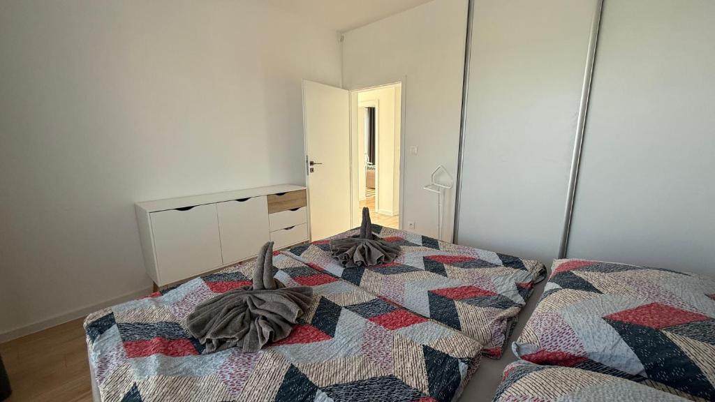 Postel nebo postele na pokoji v ubytování Klimatizovaný Apartmánový dom, s vírivkou, 1B
