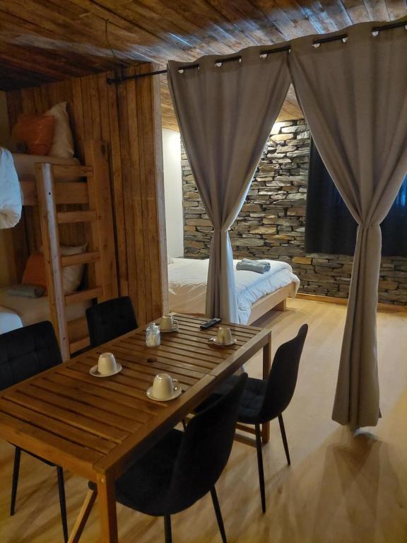 Postel nebo postele na pokoji v ubytování Le châtelain de Bouillon