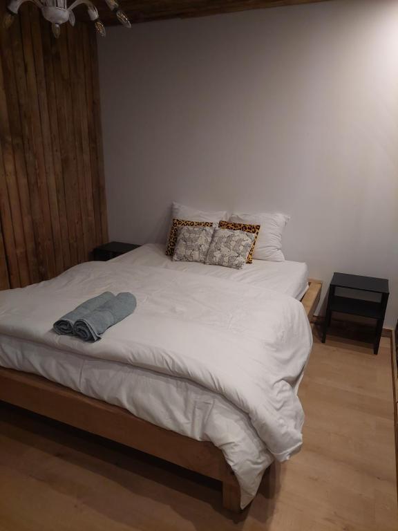 Postel nebo postele na pokoji v ubytování Le châtelain de Bouillon