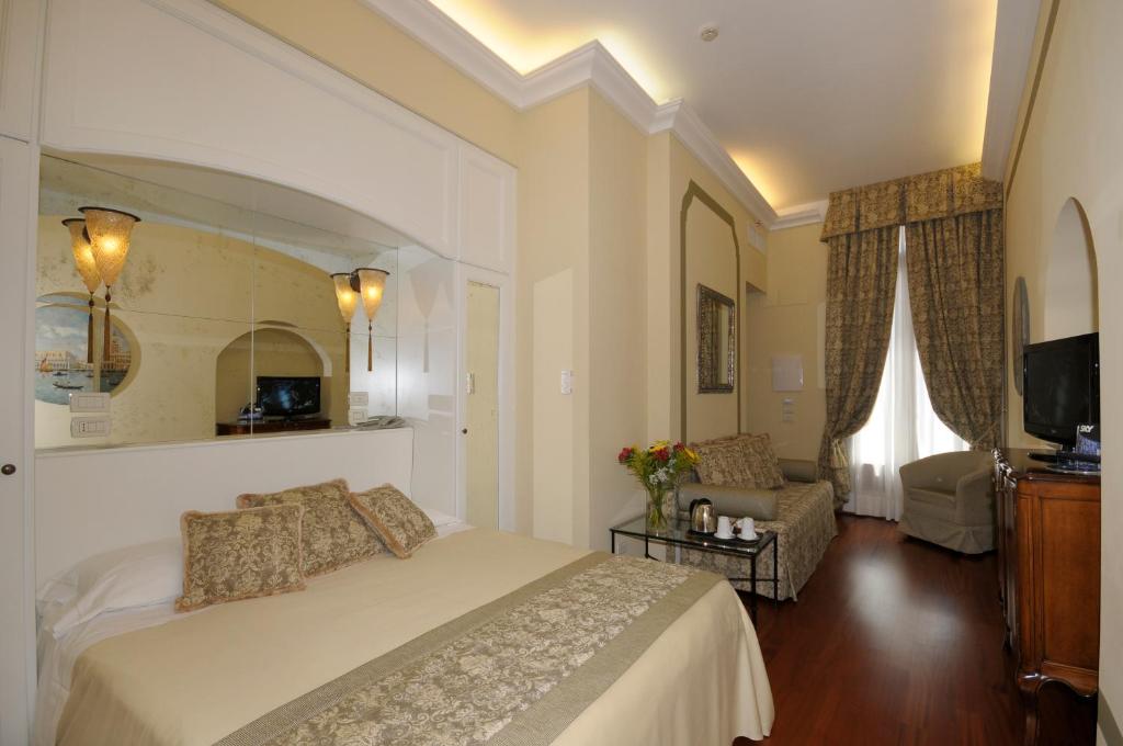 TV a/nebo společenská místnost v ubytování Hotel Le Isole