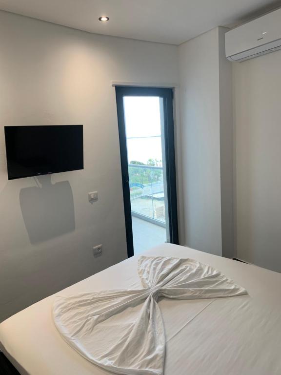 Postel nebo postele na pokoji v ubytování LISI apartments