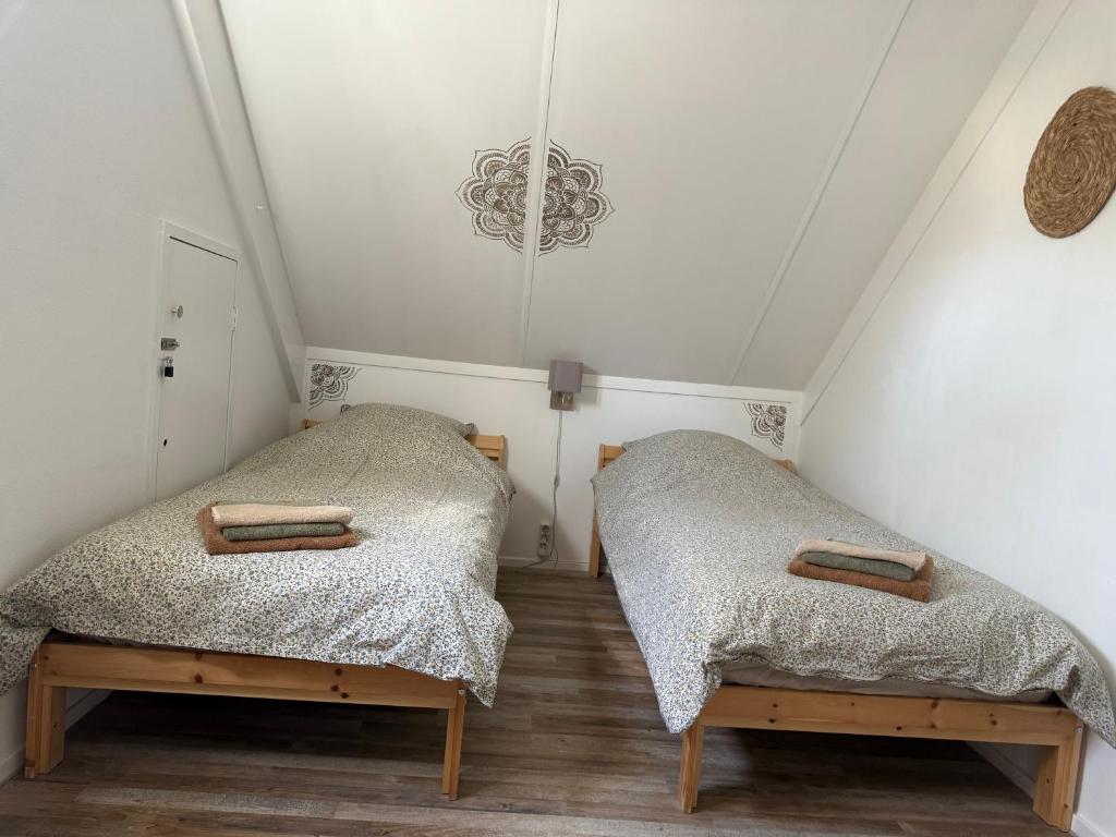 Ένα ή περισσότερα κρεβάτια σε δωμάτιο στο Wellness Huisje 52