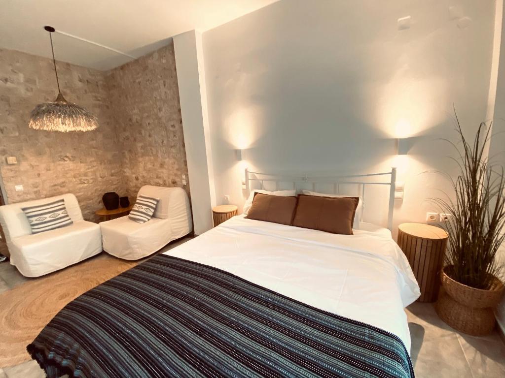 Postel nebo postele na pokoji v ubytování KIPOS-SS residences