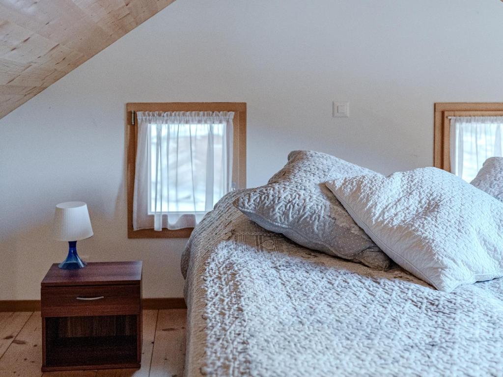 Postel nebo postele na pokoji v ubytování Mys Chalet