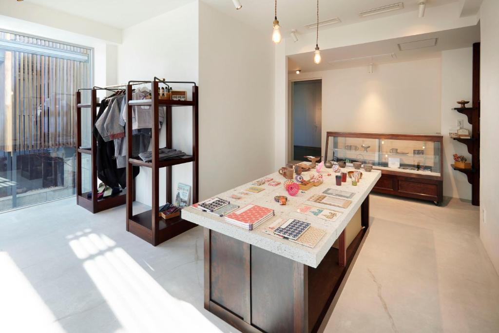 Кровать или кровати в номере Matsumoto Hotel Kagetsu