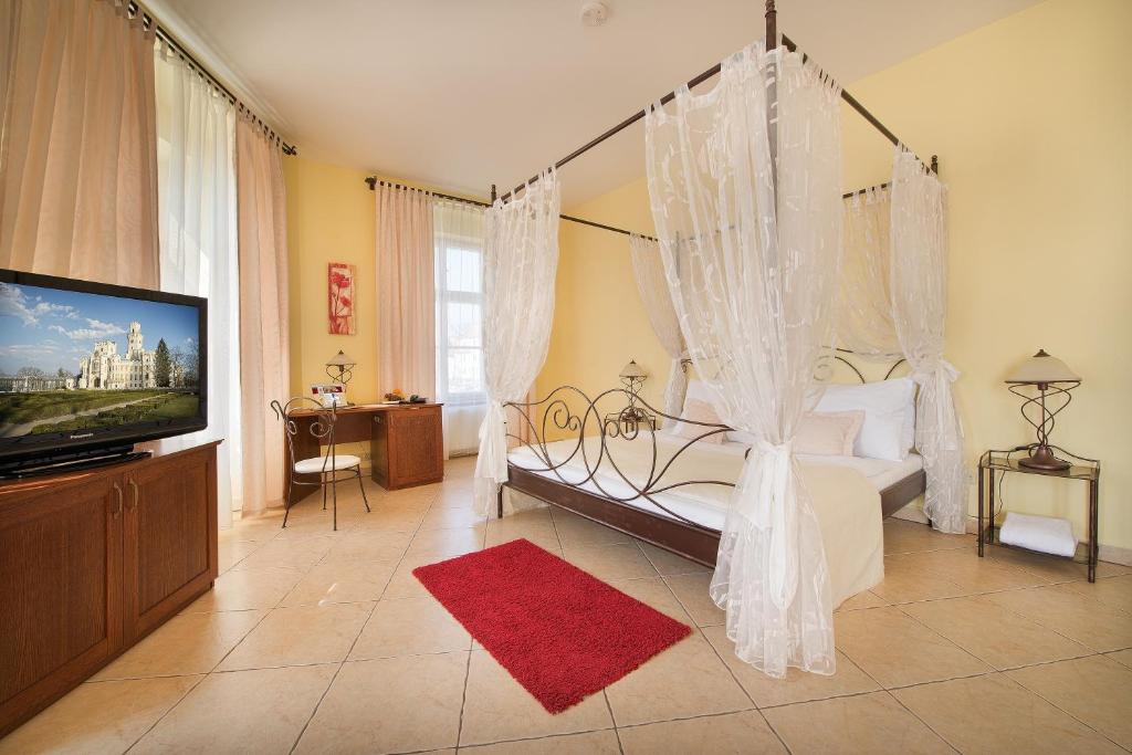 TV a/nebo společenská místnost v ubytování Residence Knížecí Dvůr