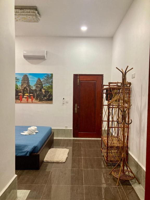 Postel nebo postele na pokoji v ubytování Lotus Haven Villa