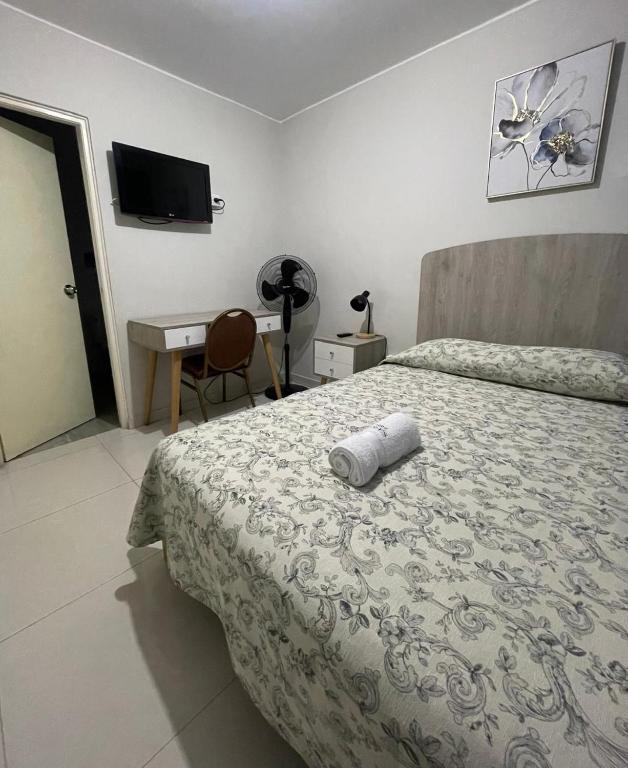 Postel nebo postele na pokoji v ubytování Casa Las Flores Ica