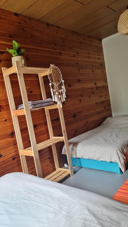 Postel nebo postele na pokoji v ubytování Utopia Climbing Community