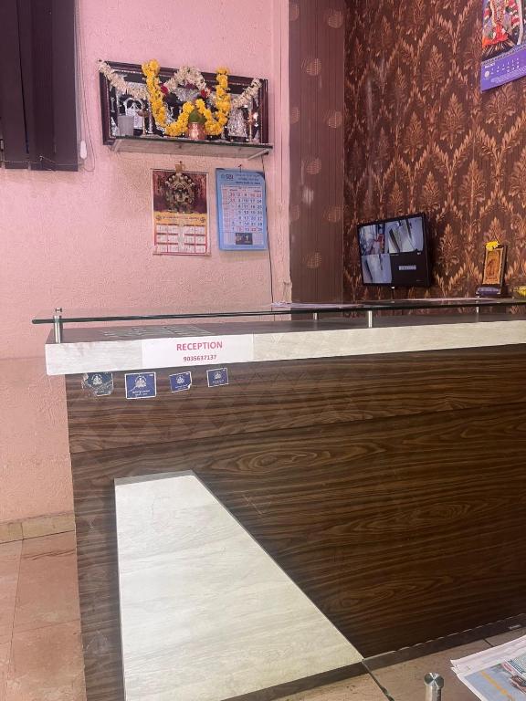 TV a/nebo společenská místnost v ubytování Hotel sai arcade