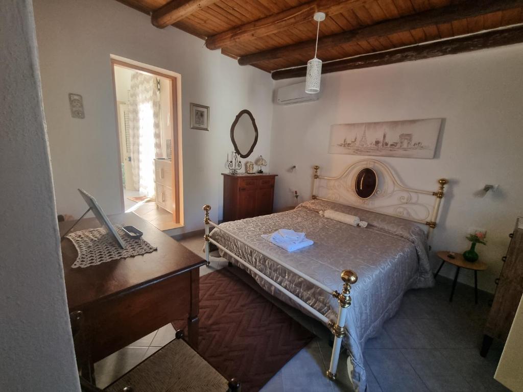 Postel nebo postele na pokoji v ubytování Casa turiddu Makari