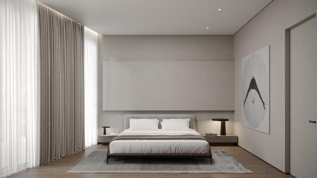 una camera da letto con un letto e una grande finestra di Dukley Villa sea view a Budua