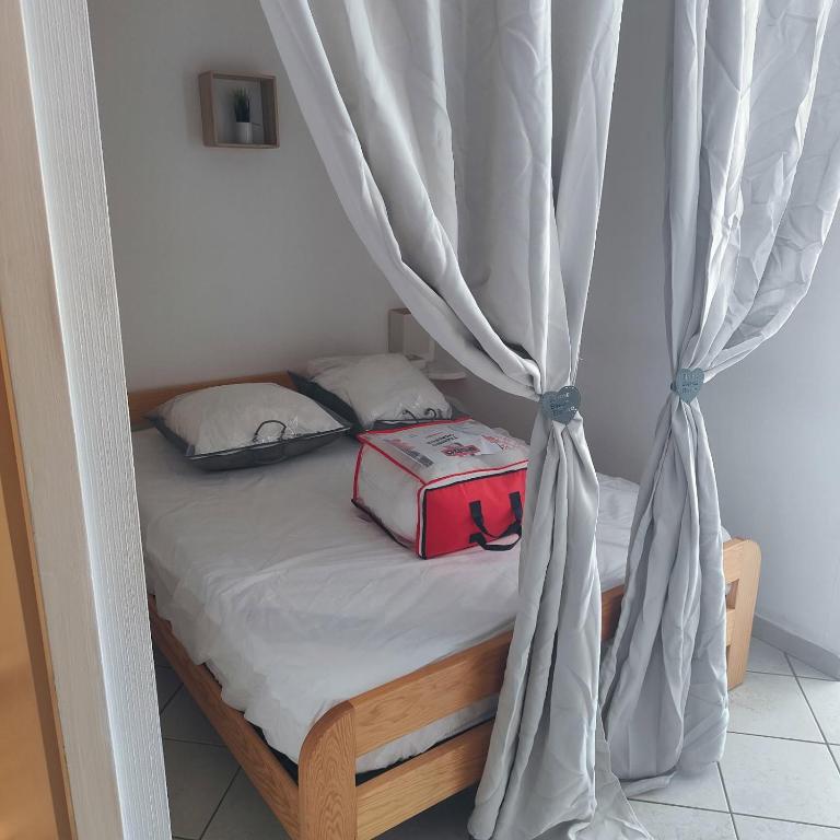 Posteľ alebo postele v izbe v ubytovaní Face estacade, studio 4 personnes vue mer
