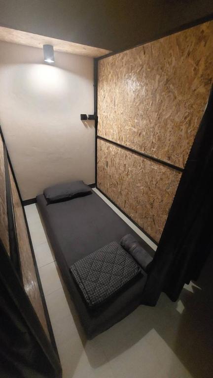 Postel nebo postele na pokoji v ubytování Outback Hostel & Community