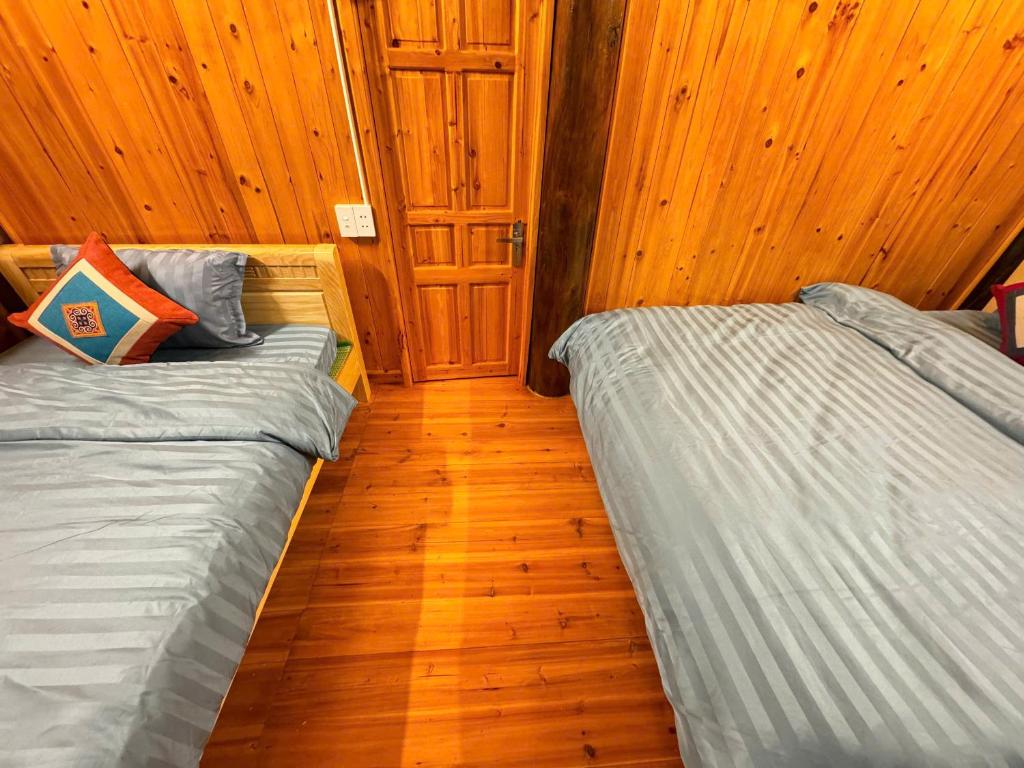 Postel nebo postele na pokoji v ubytování Cloud Mountain Home SaPa