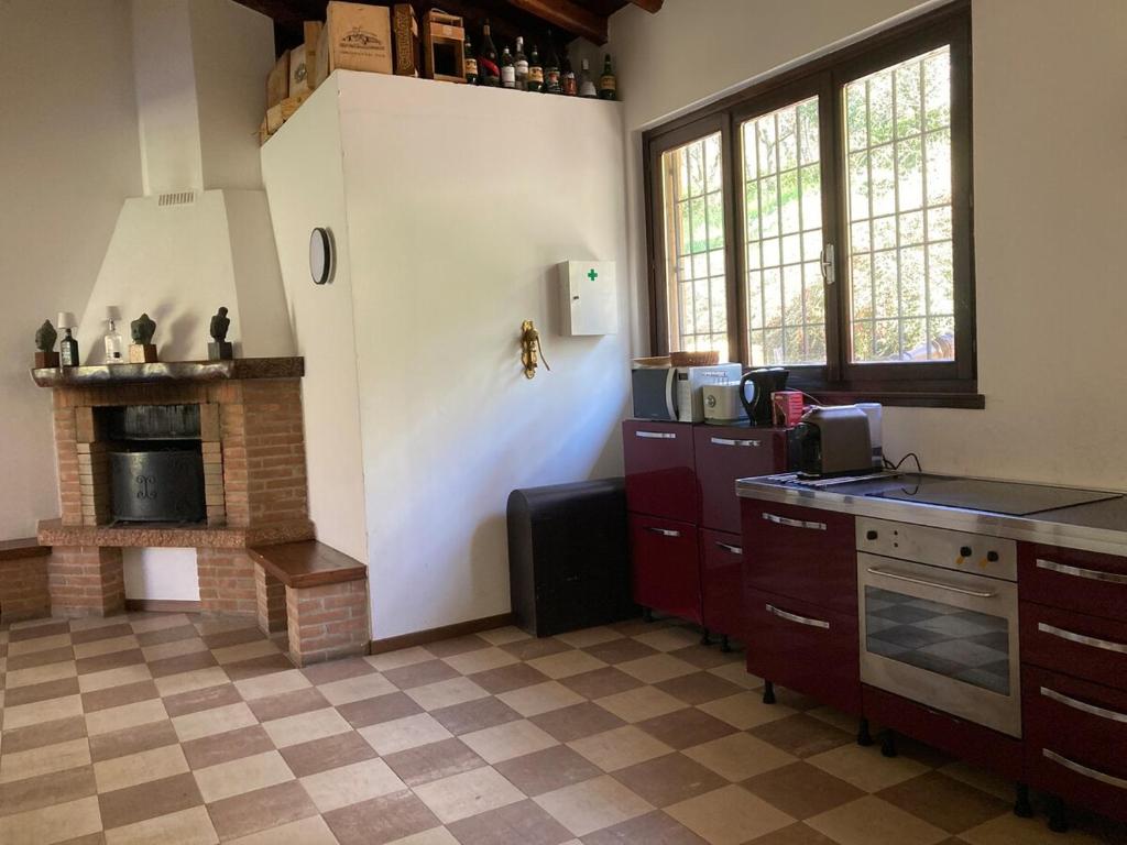 Kuchyň nebo kuchyňský kout v ubytování Villa Vinea Prisca B&B