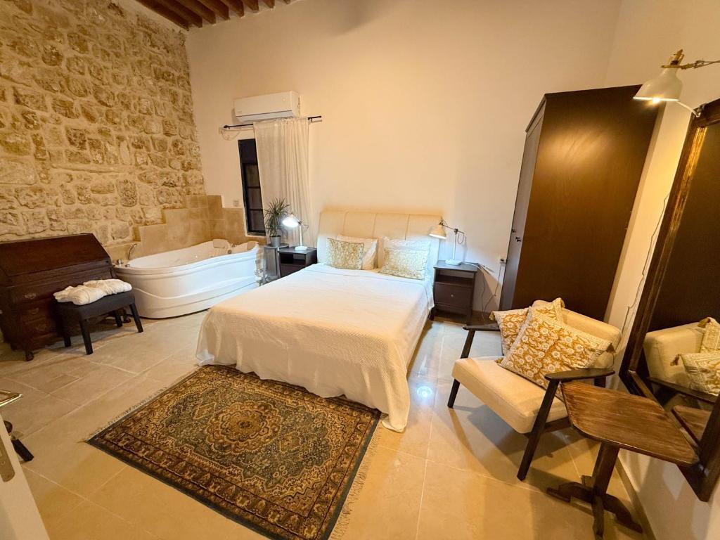 Postel nebo postele na pokoji v ubytování Nov Antique - AKKO