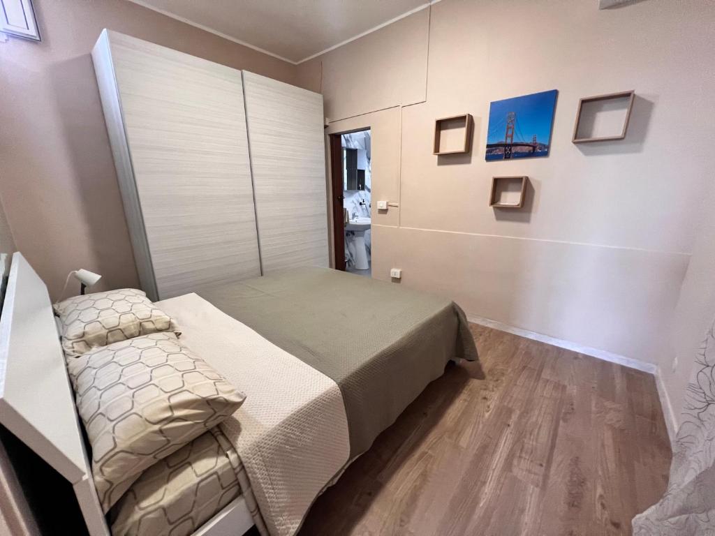 Postel nebo postele na pokoji v ubytování Appartamenti Minturnae Relais