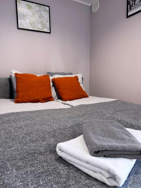 Postel nebo postele na pokoji v ubytování Apartament Dzikowiec