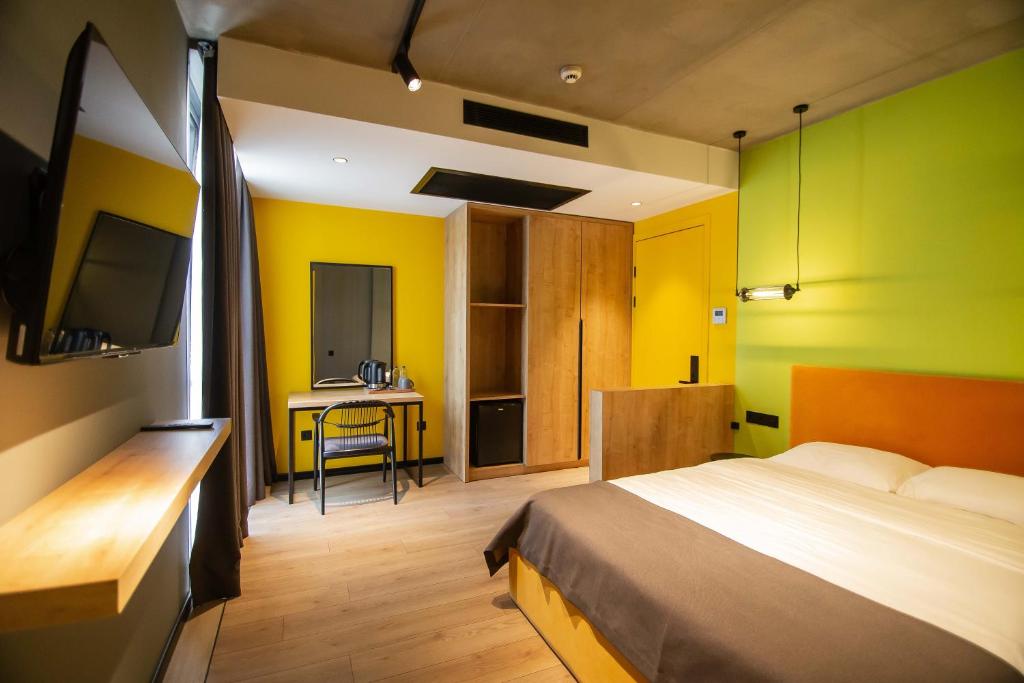 Postel nebo postele na pokoji v ubytování Hotel CH51