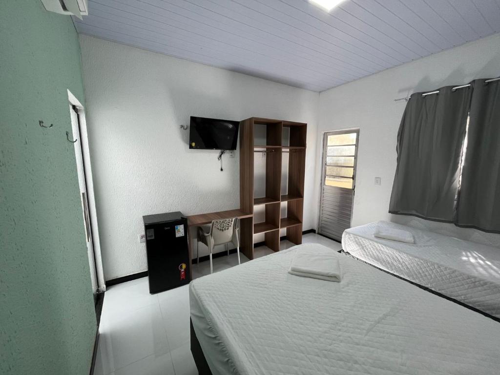Postel nebo postele na pokoji v ubytování Hotel GAB RESIDENCIAL