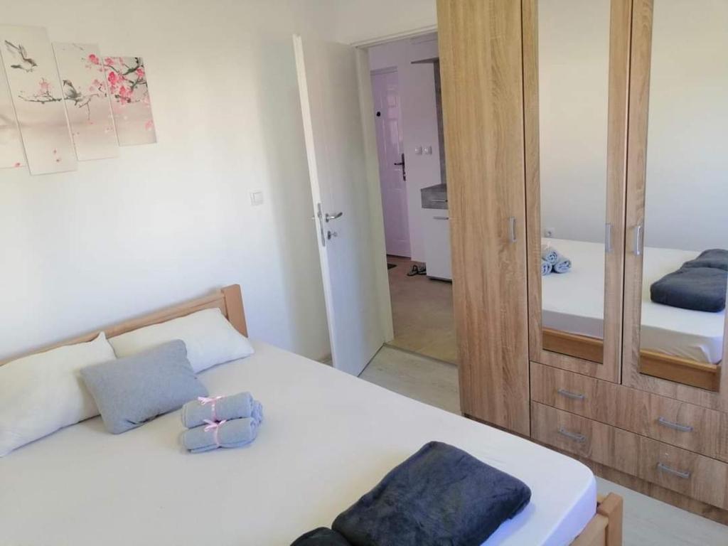Postel nebo postele na pokoji v ubytování Apartman Tamara