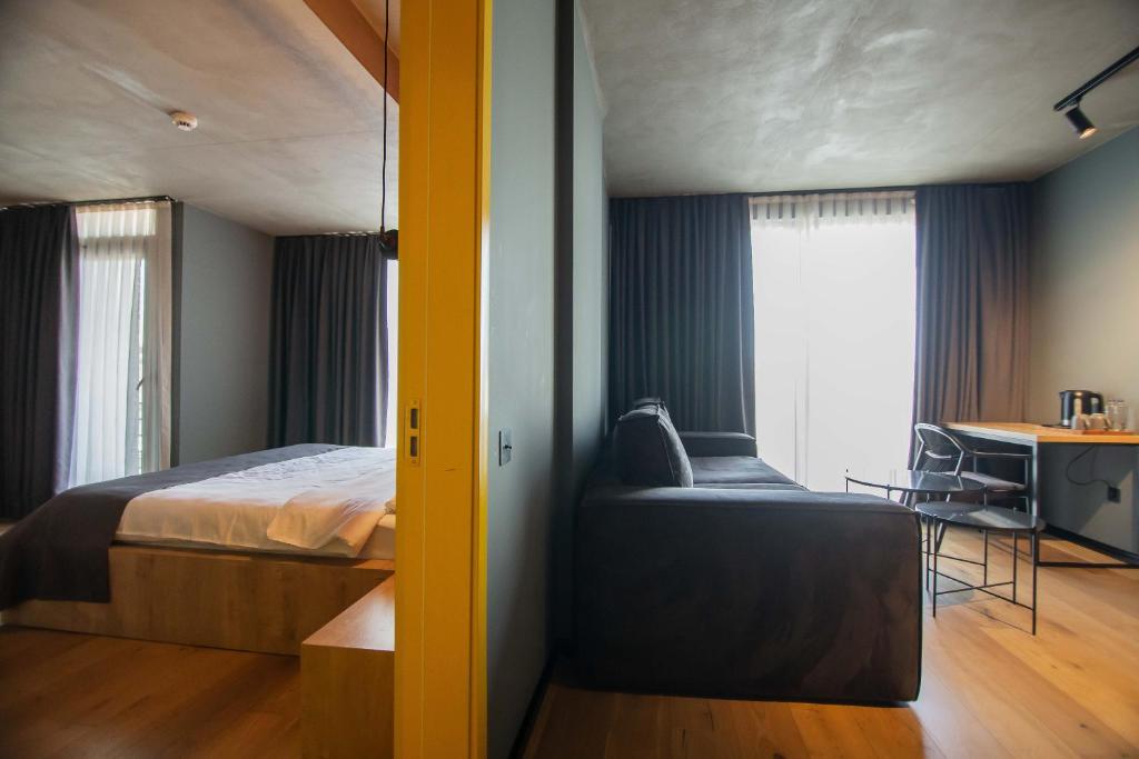 Postel nebo postele na pokoji v ubytování Hotel CH51