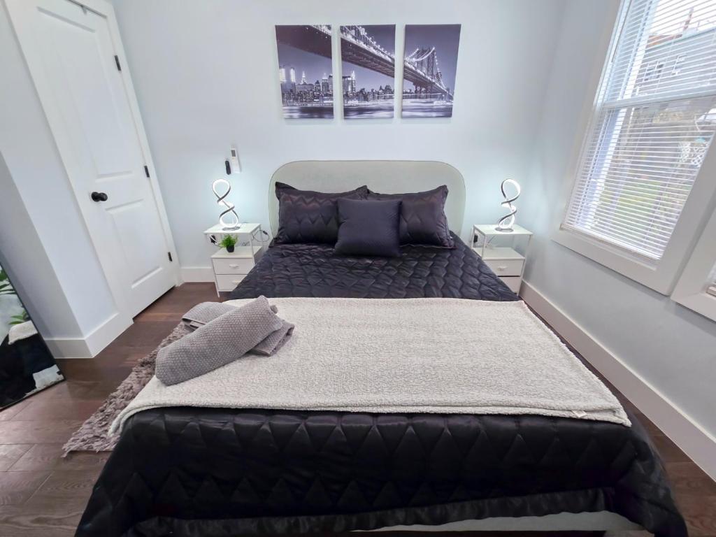 Postel nebo postele na pokoji v ubytování Cozy apartment near a New York