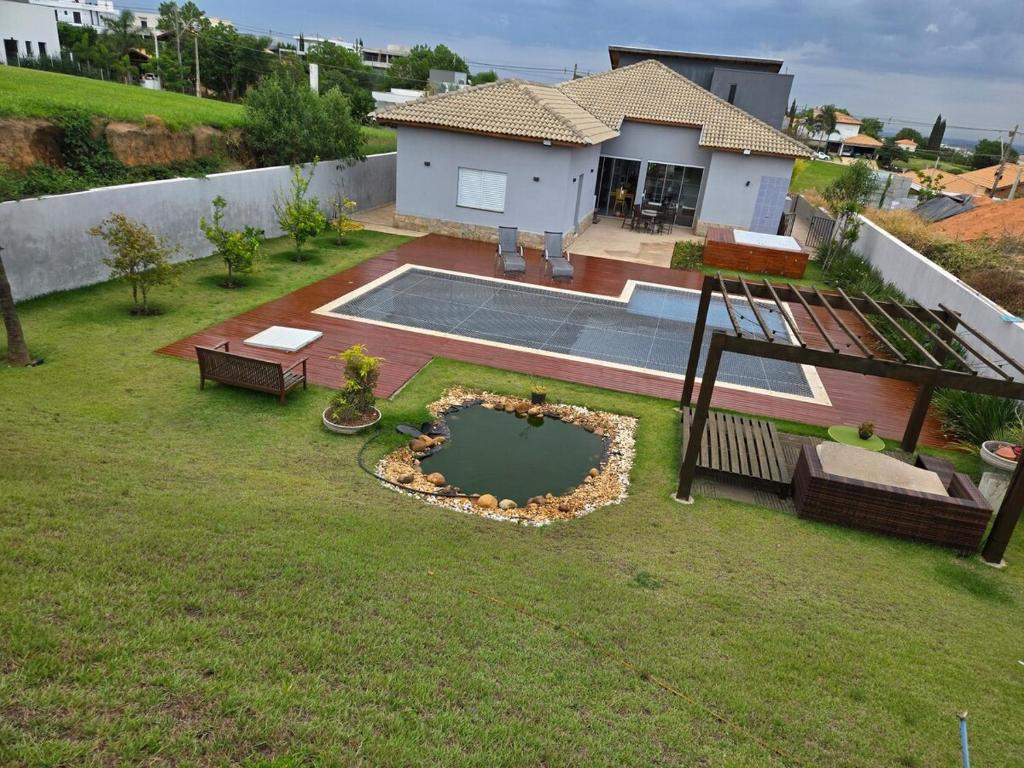 Zahrada ubytování Casa com Spa em Cond Fazenda Kurumin Itu-SP