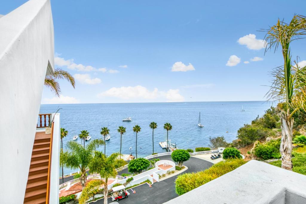 a view of the ocean from the balcony of a building at H159 - Hamilton Cove Villa 1-59 in Avalon