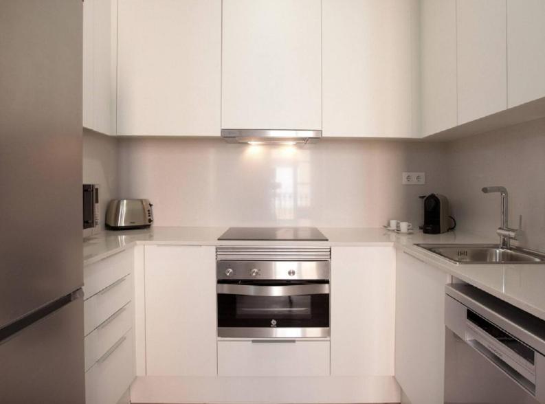 Kuchyň nebo kuchyňský kout v ubytování APBCN Eixample Center
