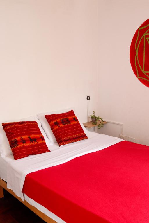 Postel nebo postele na pokoji v ubytování Temazcal Hostel