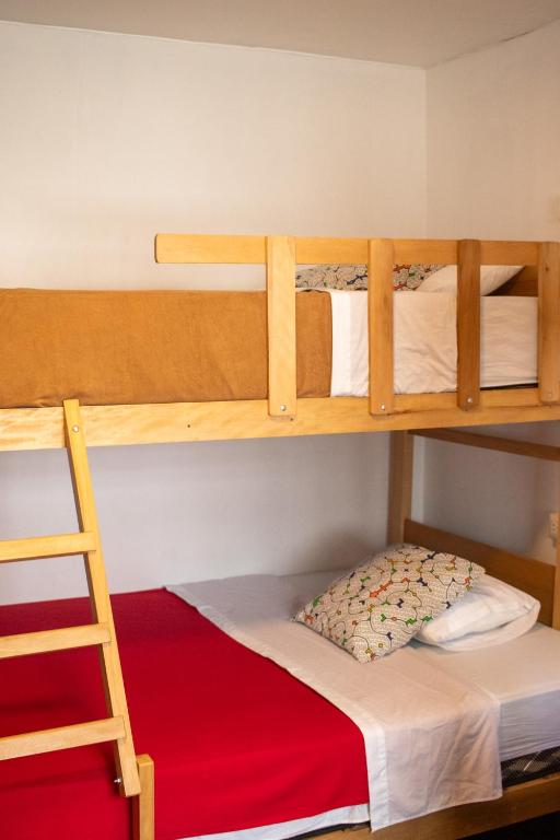 Postel nebo postele na pokoji v ubytování Temazcal Hostel