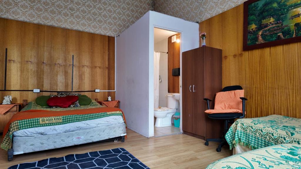Ένα ή περισσότερα κρεβάτια σε δωμάτιο στο BVC Hotel Iquique Cavancha