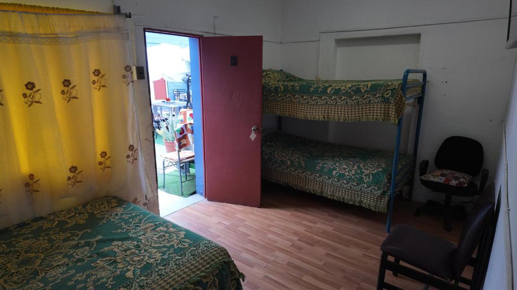 Ένα ή περισσότερα κρεβάτια σε δωμάτιο στο BVC Hotel Iquique Cavancha