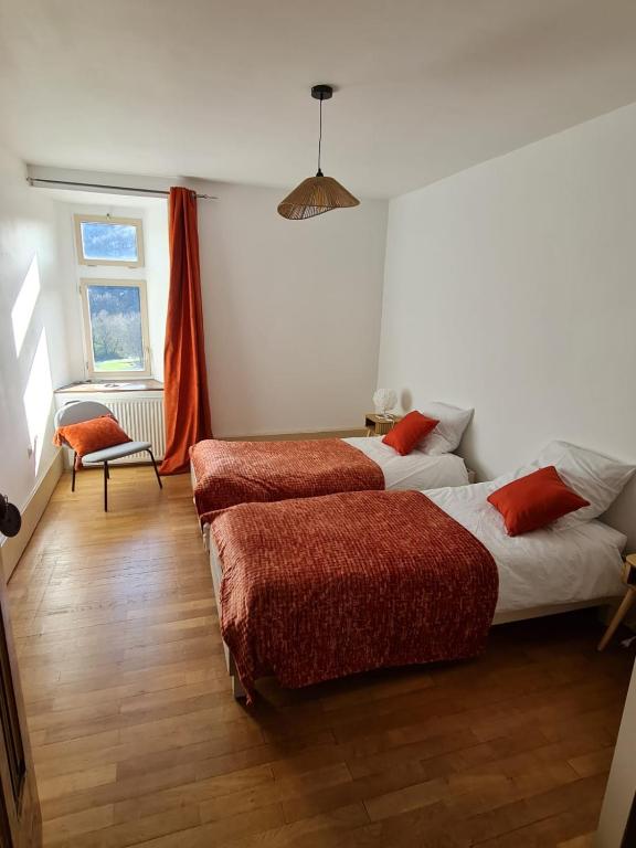 Postel nebo postele na pokoji v ubytování Château du Poët-Célard