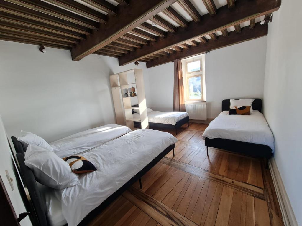 Postel nebo postele na pokoji v ubytování Château du Poët-Célard