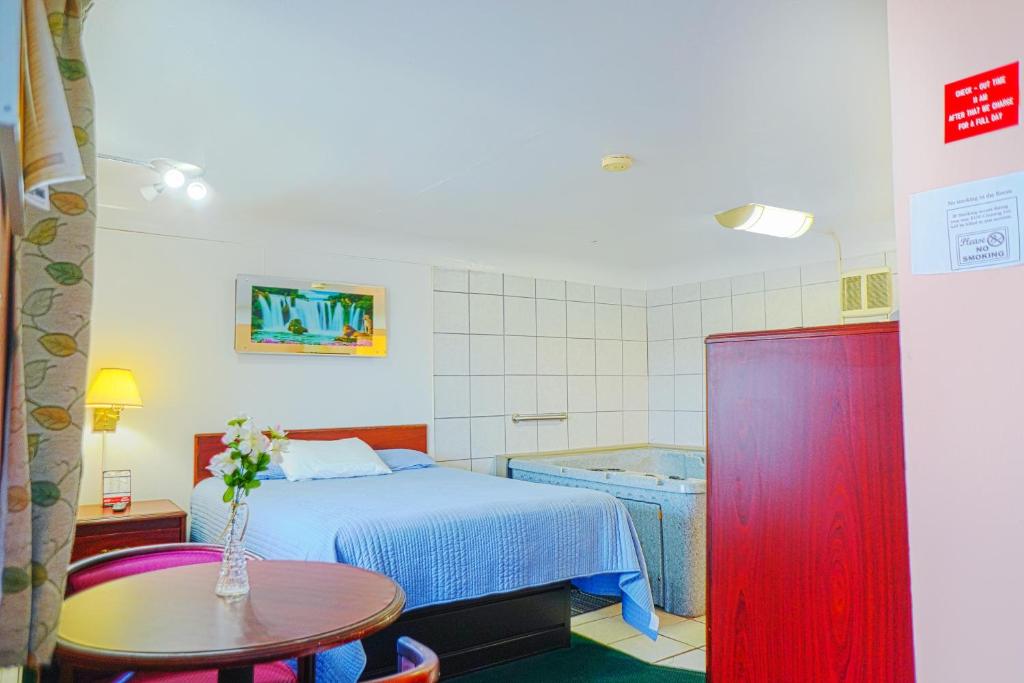 Bay Motel By OYO Bay City - Camera Queen Con Vasca Idromassaggio