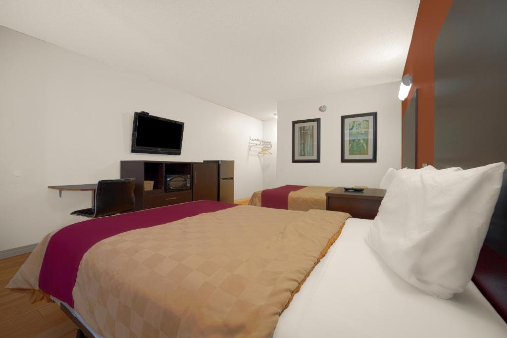 Postel nebo postele na pokoji v ubytování Mojave Hotel